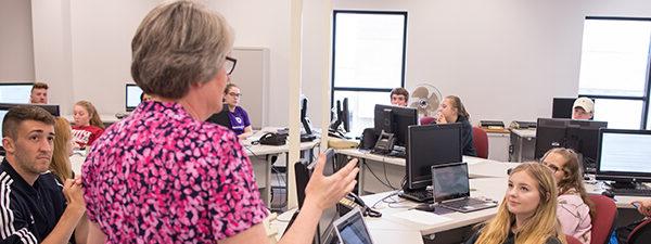 Instructor and students in classroom